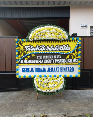 Papan Bunga Duka di Yiluk